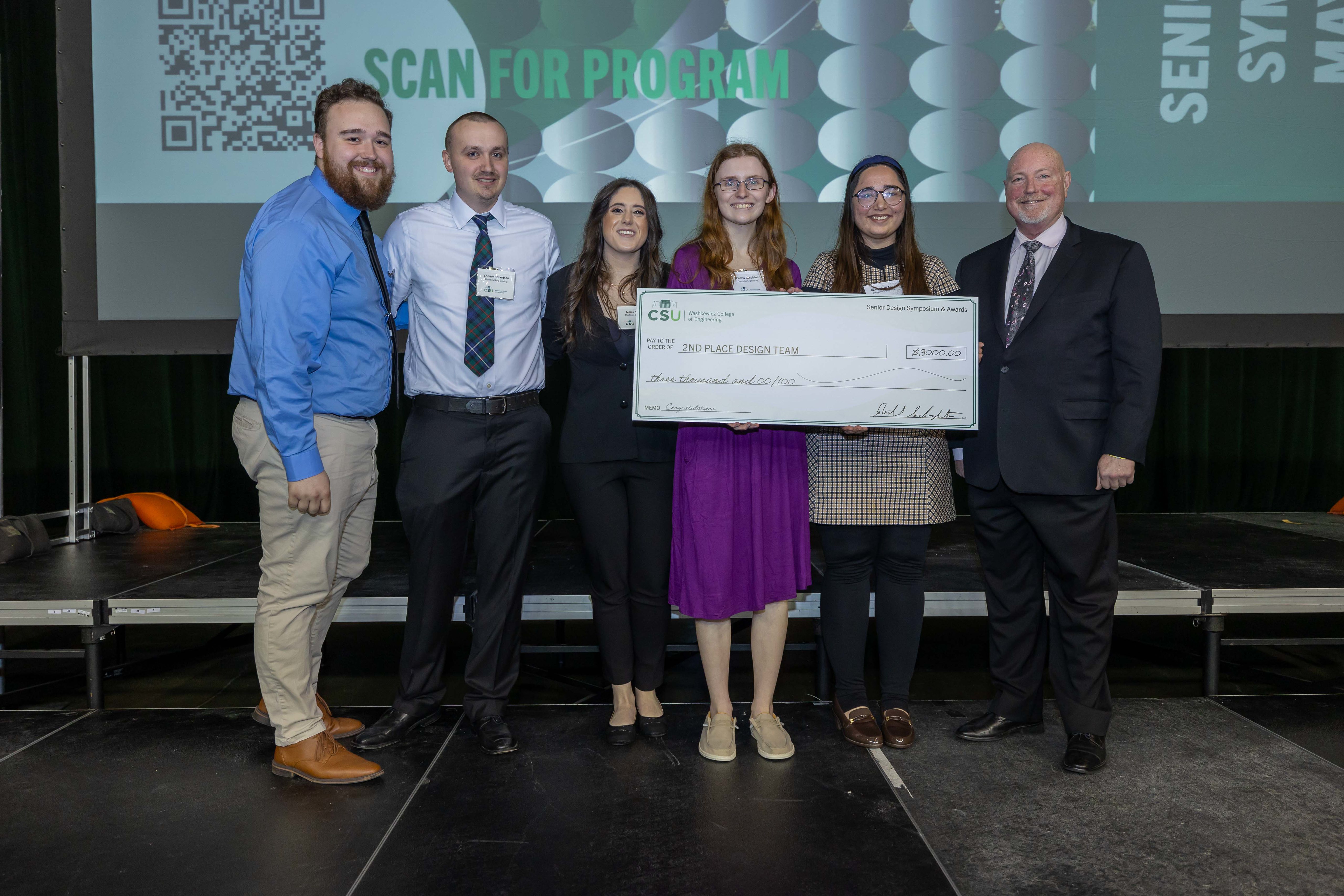 Photo of second place team senior design students and dean