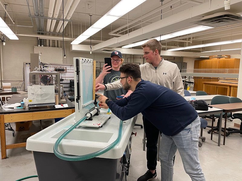 Photo of students working in a lab