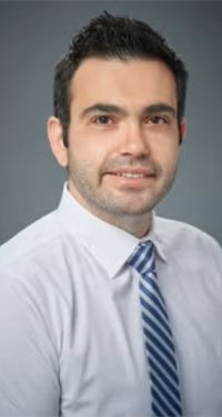Headshot of Apostolos Kalatzis.