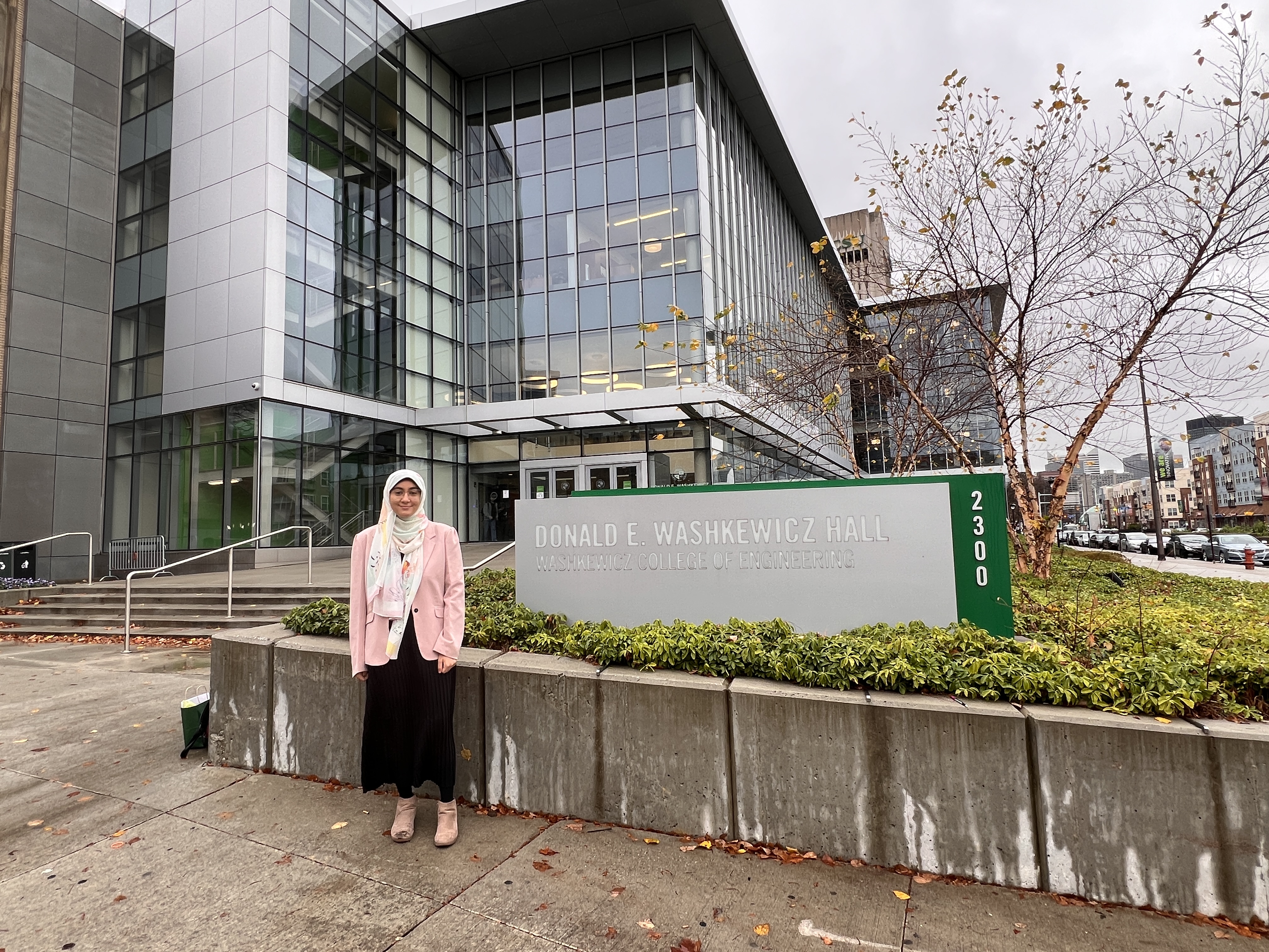 Shereen Elfadil in front of Washkewicz Hall