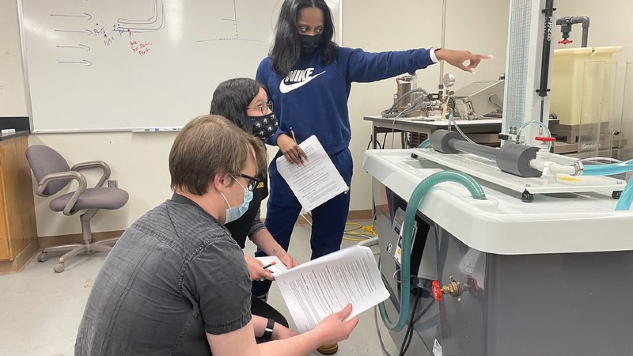 Photo of students working in a lab