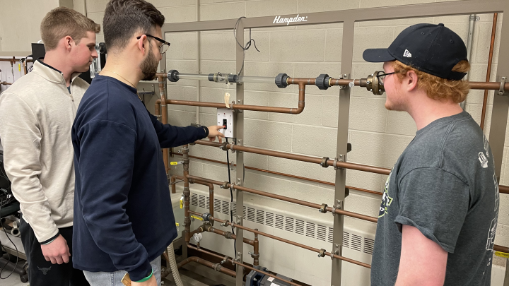 Students working on a switch