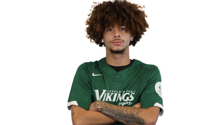 Esports player Collin crossing his arms