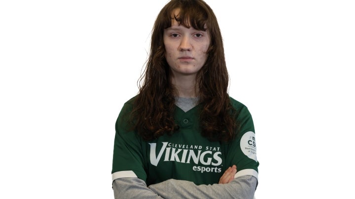 Esports player Livy crossing arms