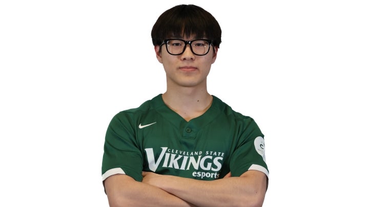 Esports player Matt Lee crossing his arms