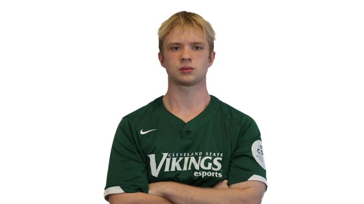 Esports player Connor crossing his arms