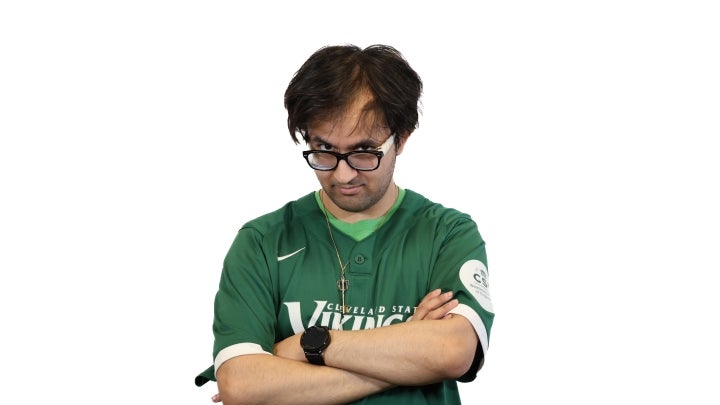 Esports player Vamsi crossing his arms