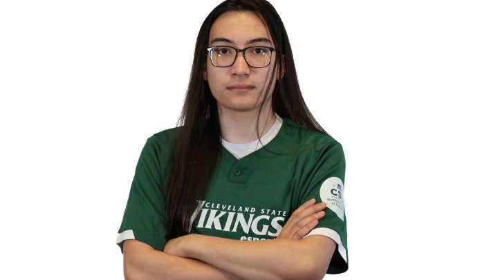 Esports player Victor crossing his arms