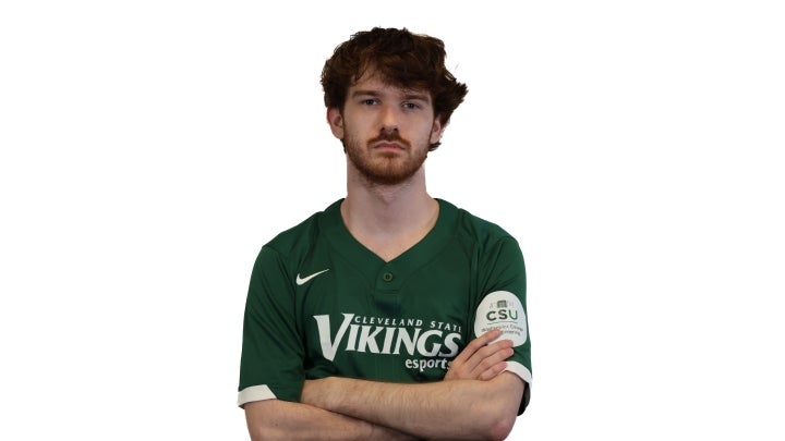 Esports player Cole crossing his arms