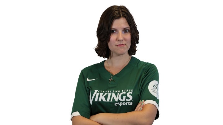 Esports player Gabby crossing her arms
