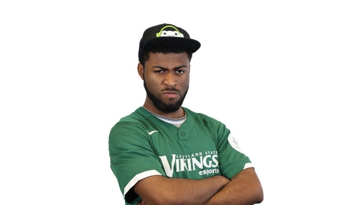 Esports player Jackson crossing his arms