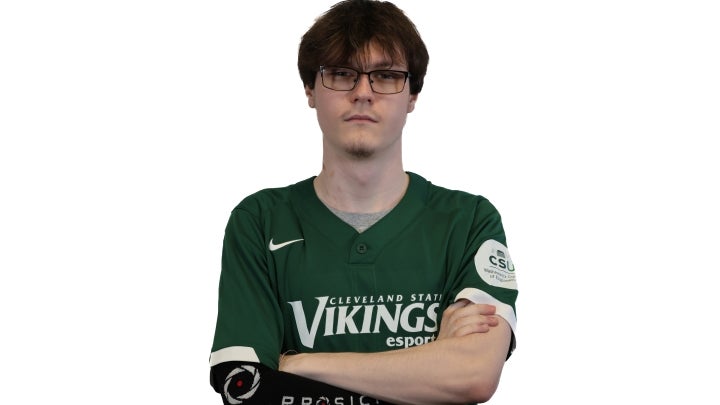 Esports player Maddux crossing his arms