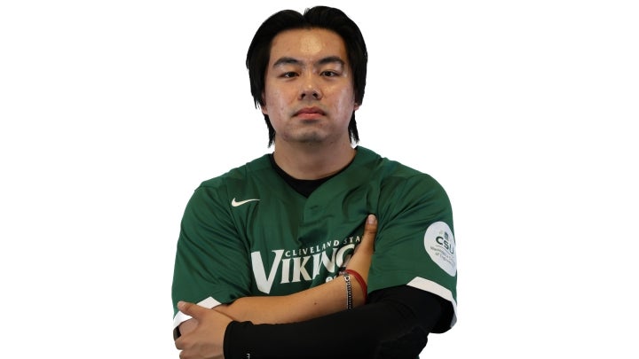 Esports player Max crossing his arms