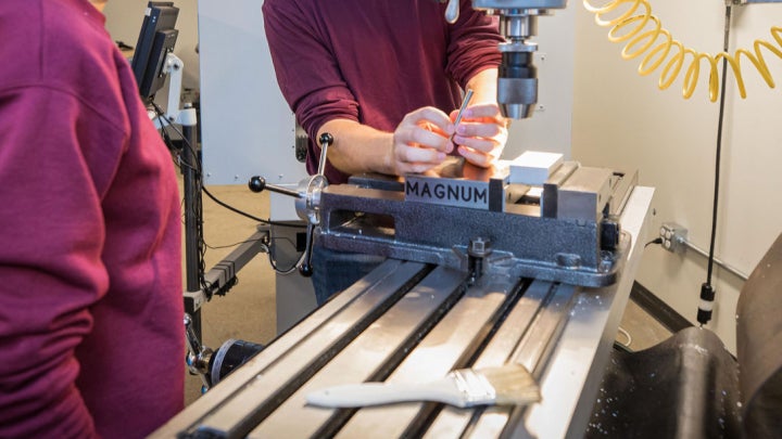 A student working on research in a lab.