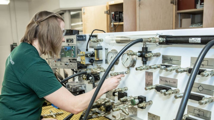 A student working on research in a lab.