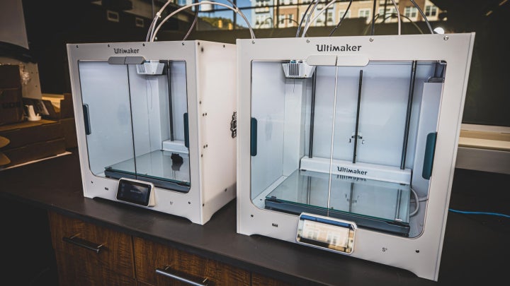 Research 3D printers in a lab classroom.