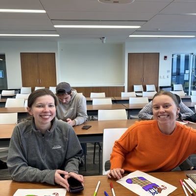 Smiling and coloring