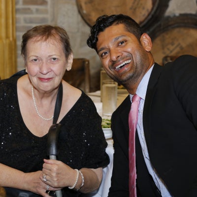 Becky Laird at a dinner table with her friend.