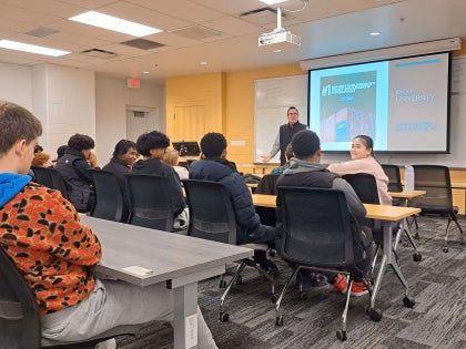 Hawken receiving Lecture