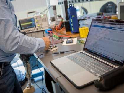 A student working on research in a lab.