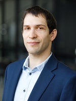 Headshot of Tamas Molnar.